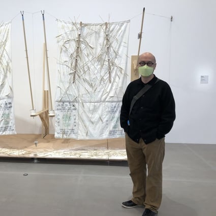 Artist and academic Kurt Chan Yuk-keung  in front of Vertical Rye Field (2021), a recreation of a 1996 original that he had taken to show in the Second Asia Pacific Triennial of Contemporary Art, in Queensland, Australia. Photo: Enid Tsui