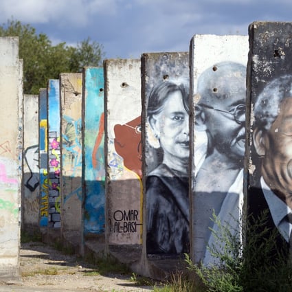 Graffitied panels of the Berlin Wall. Photo: Getty Images