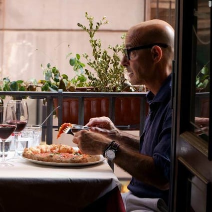 Stanley Tucci (right) speaks with professor Elisabetta Moro in Naples about the history of pizza in CNN’s six-part travelogue series Stanley Tucci: Searching for Italy. Photo: CNN