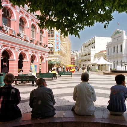 Residents of Macau spend a leisurely afternoon in Senado Square. Photo: AP