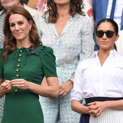 Kate Middleton and Meghan Markle in the Royal Box on Centre Court during day 12 of the Wimbledon Tennis Championships on July 13, 2019 in London, England. Photo: Getty Images