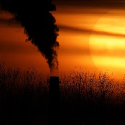 Emissions from a coal-fired power plant are silhouetted against the setting sun in Independence, Missouri, in the US, on February 1. Photo: AP 