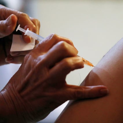 A doctor is vaccinated at Gleneagles hospital in Singapore. File photo