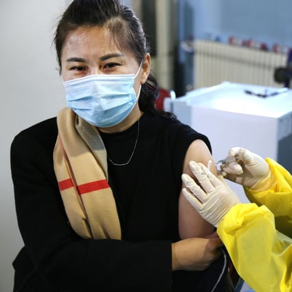 A woman receives a vaccination at a centre in Beijing, in China, on January 8. Photo: Getty Images