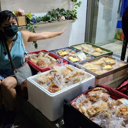 A volunteer from Breadline with unsold food for delivery to charities helping needy families in Hong Kong. Food rescue apps are a recent addition to the fight against food waste, and one has begun operating in the city. Photo: Breadline