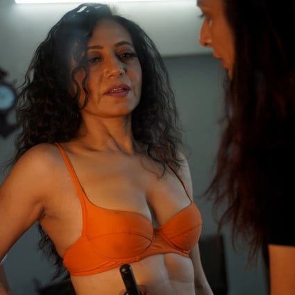Geeta J, a 52-year-old Indian lingerie model, gets ready for a lingerie photoshoot in Mumbai, India. Photo: Reuters