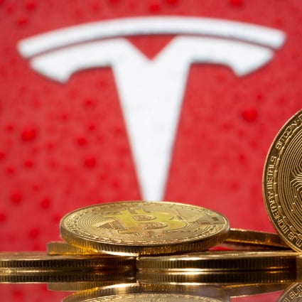 The price of both Bitcoin and Tesla has gone through the roof in the past year. Photo: Reuters 