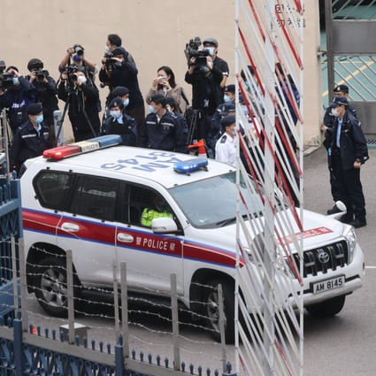 Shenzhen authorities hand over eight fugitives to Hong Kong police on Monday. Photo: Dickson Lee