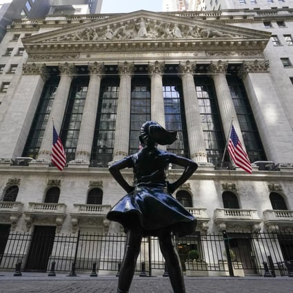 The Fearless Girl statue stands in front of the New York Stock Exchange on March 23. Photo: AP