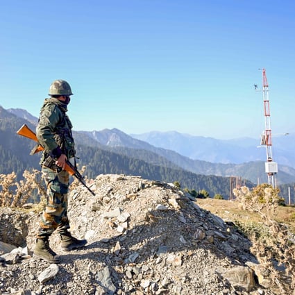 An Indian Army soldier stands guard near the border with Pakistan. Photo: AFP