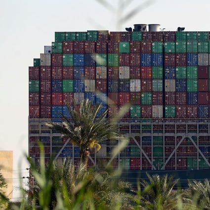 Ever Given, one of the world’s largest container ships, after running aground, in the Suez Canal. Photo: Reuters