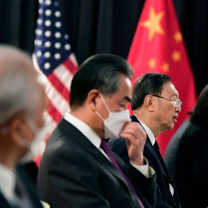 The Chinese delegation led by Yang Jiechi (centre), director of the Central Foreign Affairs Commission Office, and Foreign Minister Wang Yi at the opening session of US-China talks in Anchorage, Alaska on March 18. Photo: AFP 