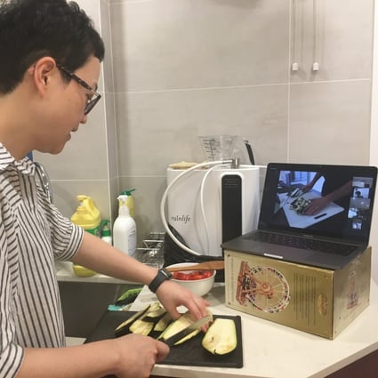 A friend of Grace Wu’s from Hong Kong follows a class on how to make a carbonara sauce on World Kitchen Club. 