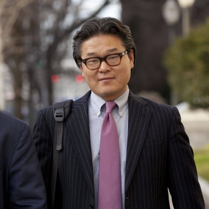 Bill Hwang, founder of of Tiger Asia Management LLC, (right) with his attorney Lawrence Lustberg in Newark, New Jersey, on Wednesday, December 12, 2012. Photo: Bloomberg