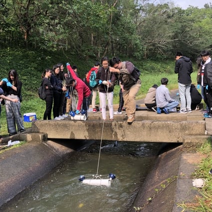 The School of Science and Technology at the Open University of Hong Kong (OUHK) has been part of FreshWater Watch. Here students  practice  water sampling. Photo: Open University of Hong Kong