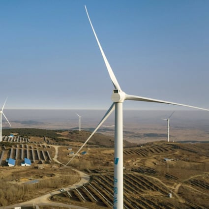 Wind turbines and solar panels near Fuxin, Liaoning province, China, Photo: Bloomberg