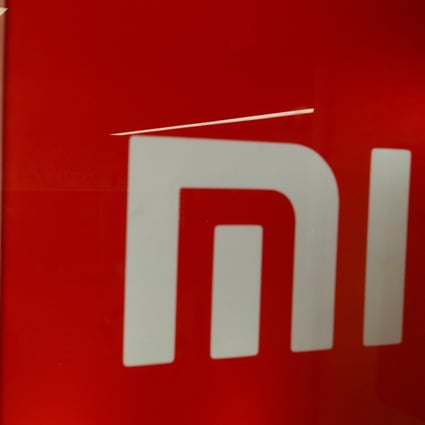 Xiaomi’s iconic “mi” logo on top of an orange background got a revamped design with rounded corners, but the company largely drew mockery online over the expense. Photo: Reuters