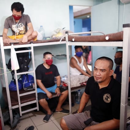 Filipino seafarers stranded amid the coronavirus pandemic rest inside a dormitory in Manila, Philippines, on April 29, 2020. Photo: EPA-EFE
