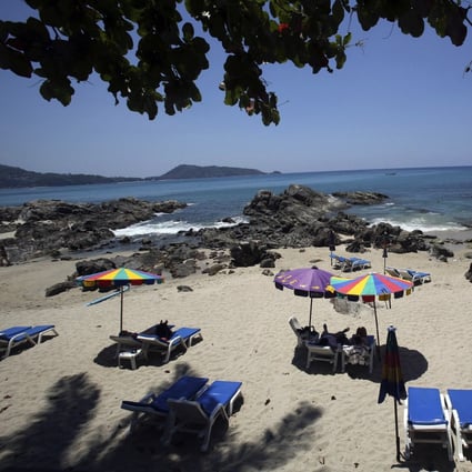 Tourists are seen on Patong Beach in Phuket before the pandemic. From July, people who have been vaccinated will not need to quarantine in the province, as Thailand seeks to restart its tourism industry. Photo: AP
