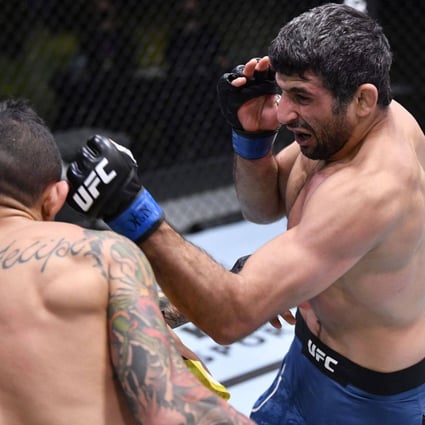 Beneil Dariush punches Diego Ferreira in their lightweight bout at UFC Fight Night on February 6, 2021 at the Apex facility in Las Vegas Nevada. Photo: Chris Unger/Zuffa LLC via Getty Images