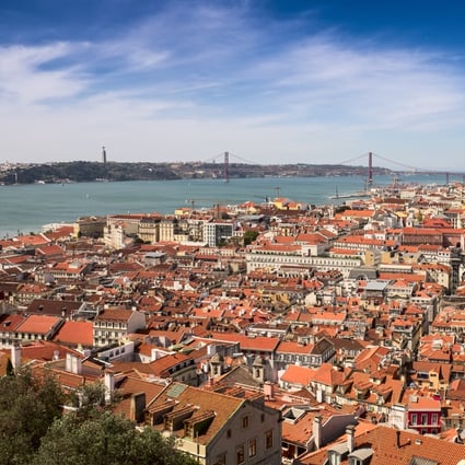 Aerial view from Castle of Saint George or Sao Jorge to the historical centre of Lisbon. Photo: Shutterstock