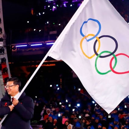 During the closing ceremony of the 2018 Winter Games in South Korea, Thomas Bach, the president of the International Olympic Committee (left), passed the Olympic flag in 2018 to Chen Jining, the mayor of Beijing,  which will host the 2022 Winter Games. Photo: AFP via Getty Images/TNS)