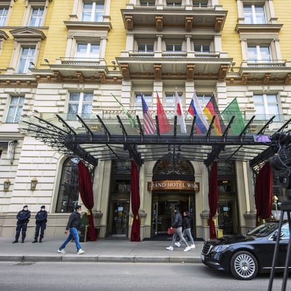 Police officers stand in front of the Grand Hotel in Vienna, where talks on the Iran nuclear deal were held on Tuesday. Photo: EPA-EFE
