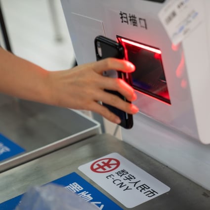Signage for the digital yuan at a self check-out counter inside a supermarket in Shenzhen on November 20, 2020. Photo: Yan Cong