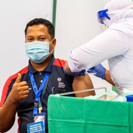 A man receives a dose of Sinovac’s Covid-19 vaccine at a hospital in Malaysia in March. Photo: Xinhua
