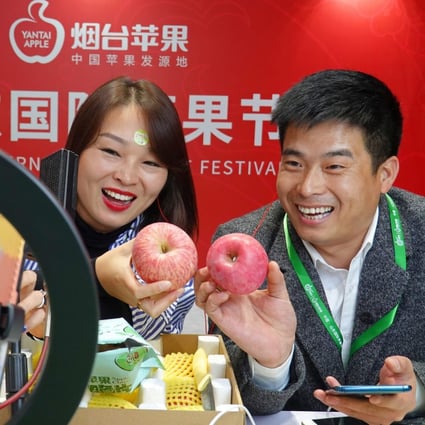 Sellers promote apples through live-streaming during the China Shandong International Apple Festival in Yantai, in east China’s Shandong Province, on October 27, 2020. Live-streaming e-commerce has become a popular form of shopping online in China. Photo: Xinhua
