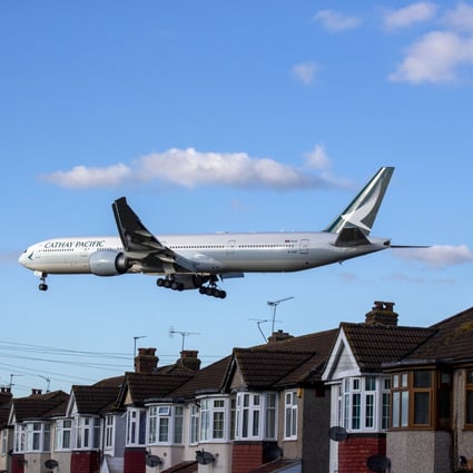 A Cathay Pacific Boeing 777 plane lands at Heathrow Airport in London. Photo: Getty Images