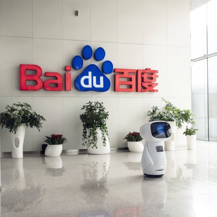 An artificial intelligence robot in front of the the Baidu logo at the company’s headquarters in Beijing, China, on March 4, 2021. Photo: Bloomberg