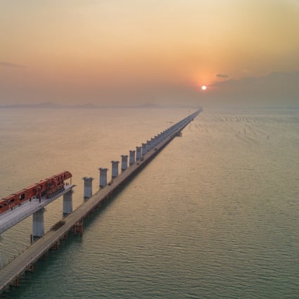 The Meizhou Bay cross-sea bridge of the Fuzhou-Xiamen high-speed railway in Fujian province is under construction in January this year. The Chinese use state-owned enterprises to implement long-term goals, such as the modernisation of infrastructure, job stability, regional development and provision of social utilities. Photo: Xinhua