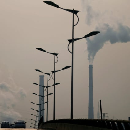 Smoke rises from chimneys of a steel plant on a hazy day in Tangshan, Hebei province. Photo: Reuters