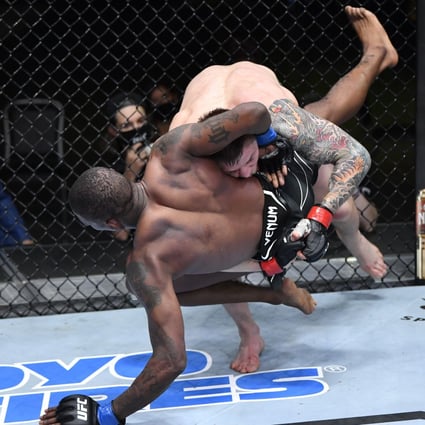 UFC middleweight Marvin Vettori of Italy takes down Kevin Holland in their fight at the UFC Fight Night at the Apex Arena in Las Vegas, Nevada in April. Photo: Zuffa LLC   
