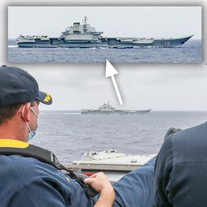 The US officers watch the Chinese carrier from the deck of their ship. Photo: Handout