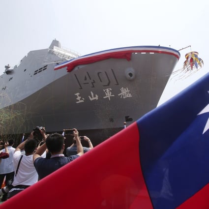 The Yushan amphibious transport vessel is launched in Kaohsiung on Tuesday. Photo: AP