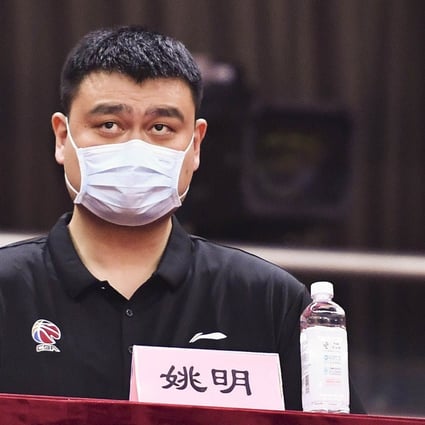 Yao Ming, chairman of the Chinese Basketball Association, watches the 2019-2020 CBA Finals. Photo: Xinhua