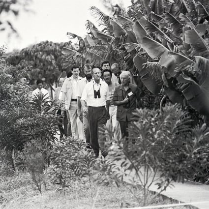 Prince Philip (centre) strolls through the wildlife reserves at Mai Po during his visit to Hong Kong in October 1986. As WWF president, he inaugurated the Mai Po wildlife education centre. Photo: SCMP