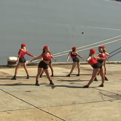 A dance troupe performs in front of a new naval supply vessel, causing controversy in Australia. Photo: Handout