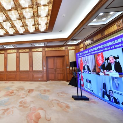 China’s Foreign Minister Wang Yi hosts a video conference with his counterparts from Afghanistan, Pakistan and Nepal in July 2020. Photo: Xinhua