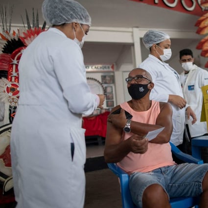 Chinese company Sinovac’s Covid-19 vaccine is administered to a man in Rio de Janeiro, Brazil. Photo: AFP