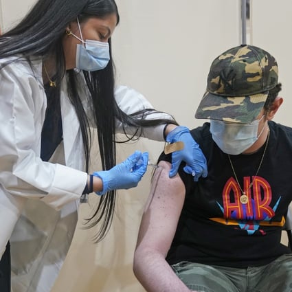 A man receives the Pfizer Covid-19 vaccine in West New York, US. Photo: AP