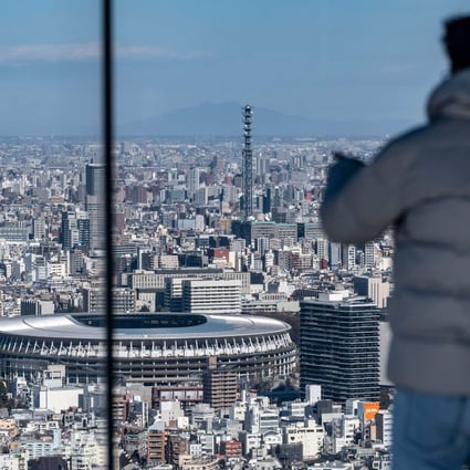 Visitors to the Shibuya Sky observation deck in Tokyo enjoy the view. Photo: AFP