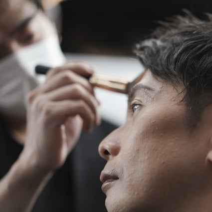 Yoshihiro Kamichi, a 44- year-old Japanese businessman, gets make-up applied at Ikemen-Works. Photo: AP