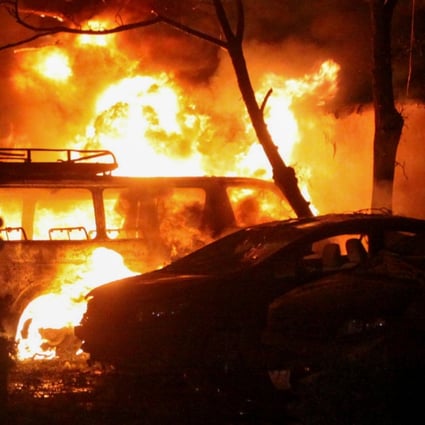 A police officer reacts after an explosion at a luxury hotel in Quetta, Pakistan on Wednesday. Photo: Reuters