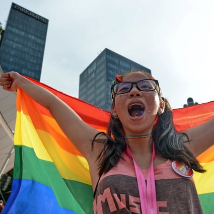 A supporter attends the annual Pink Dot event in support of the LGBT community in Singapore. Photo: AFP