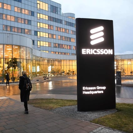 A woman walks past the Ericsson headquarters in Stockholm, Sweden, on January 24, 2020. Photo: AFP