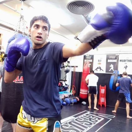 Local martial artist Rehaan Lulla punches the bag at the Versus Performance gym in Sheung Wan, Hong Kong in 2020. Photo: Versus Performance   