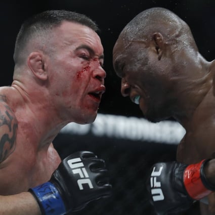 UFC welterweight champion Kamaru Usman throws punches in the fifth round with contender Colby Covington in their title fight at UFC 245 in the T-Mobile Arena in Las Vegas, Nevada in 2019. Photo: AFP   